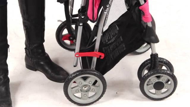 The stroller has 2 big wheels at the back and 2 small wheels in front to ensure stable ride in all terrain. - Kolcraft Cloud Plus Lightweight Stroller Review | Baby Journey