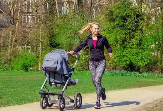 Jogging mom with a jogging stroller | Best Jogging Stroller | Baby Journey