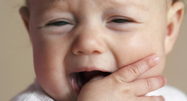 Teething causes a lot of discomfort, which can lead to fussy eating. - A Guide on Baby Fussing When Breastfeeding | Baby Journey