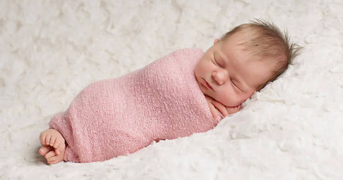 Swaddling helps babies feel safe and secure. - A Guide on Baby Fussing When Breastfeeding | Baby Journey