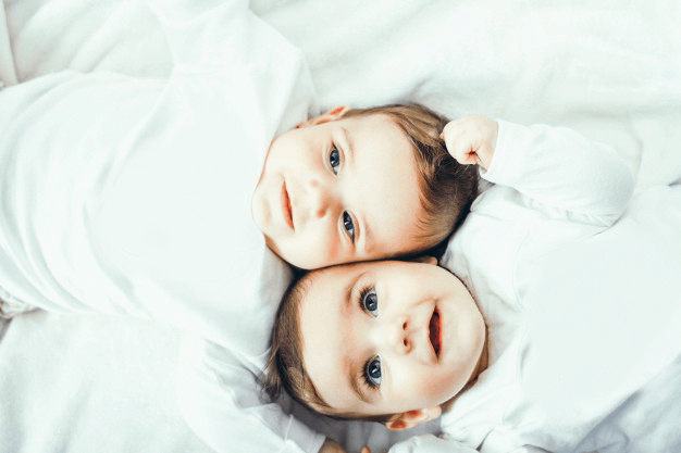 Twins Laying on Bed | Best Baby Monitor for Twins | Baby Journey