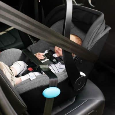 An example of a seat belt installation method for a rear-facing infant car seat without base.  - How to Install a Car Seat | Baby Journey 