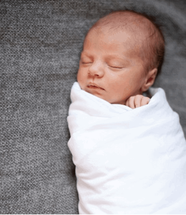 Swaddling keeps your baby warm and secure all night long. - How to Make Crib Mattresses Softer | Baby Journey 