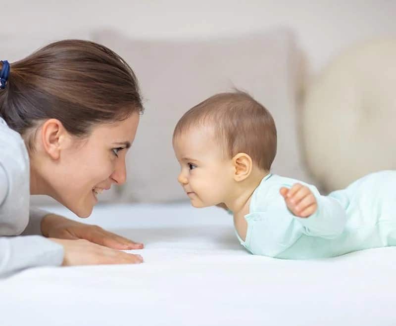 Eye contact helps your baby enjoy tummy time. - When to Start Tummy Time for Your Baby | Baby Journey