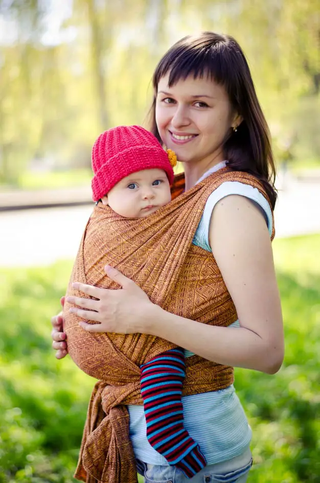 A baby wrap is ideal for newborns, though it requires some learning curve to wrap it properly  | Baby Carrier vs Wrap vs Sling: The Basics of Babywearing | Baby Journey