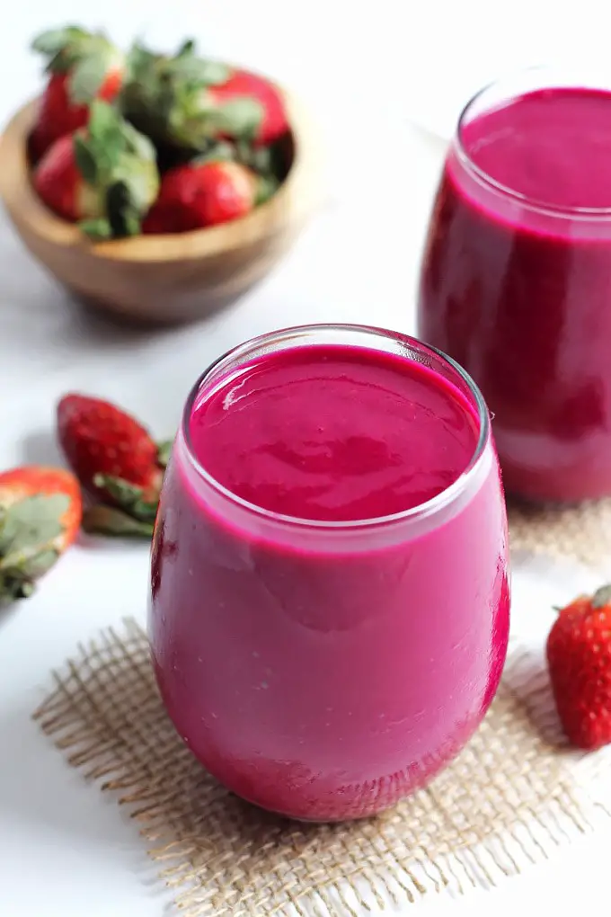 The kids will be amazed at the bright purple color of the smoothie. - 16 Irresistibly Yummy Smoothie Recipes for Kids and Toddlers | Baby Journey Blog