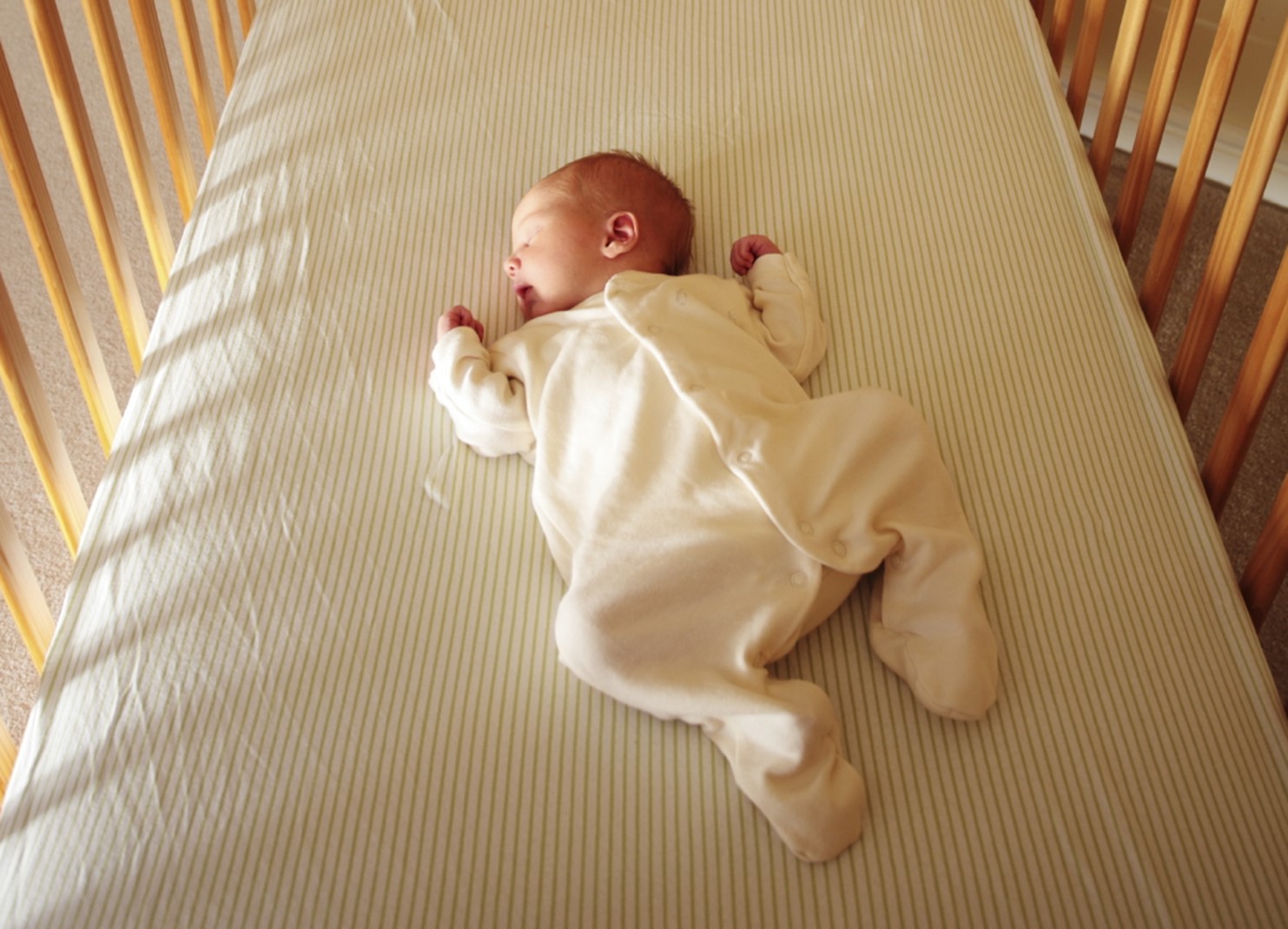 Позы для сна новорожденного