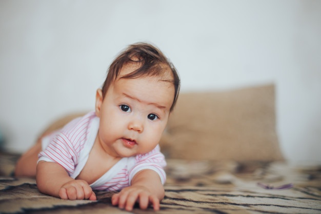 Placing the baby on the tummy may help with passing gas and relieving discomfort in the belly.  - Why Does Baby Farts Smell Like Rotten Eggs and What to Do to Resolve It? - Baby Journey