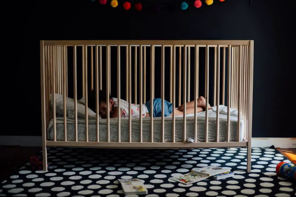 When your child outgrows their crib they may be ready for a toddler bed. - When To Lower Crib Mattress? An Easy Guide to Understanding Your Baby's Crib Setting - Baby Journey blog