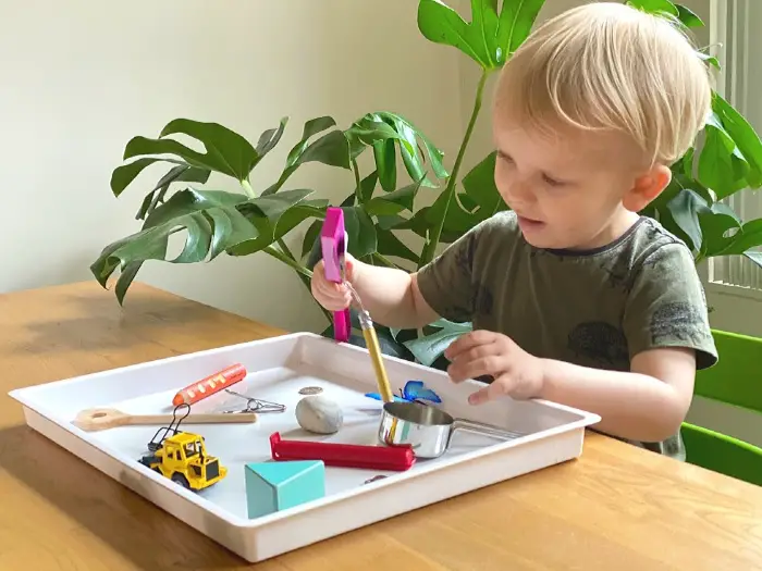 Kids choose their own work in Montessori group setup - Montessori learning vs Play-based - Baby Journey blog
