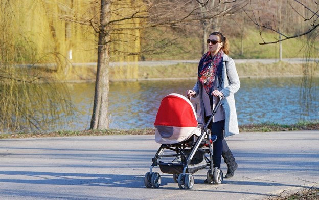 Mother Strolling With Baby in Park | Best Chicco Stroller | Baby Journey
