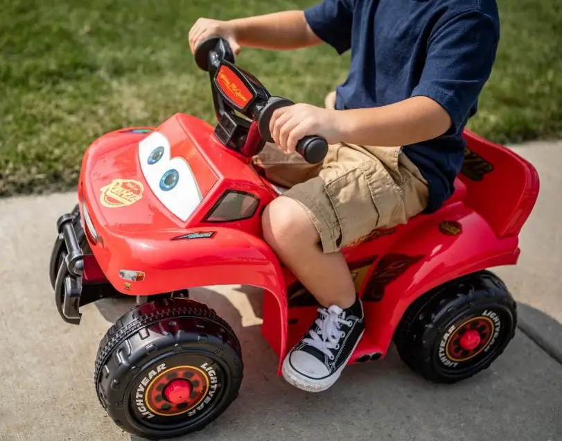 Young boy riding on toys - Ride on toys for toddlers - Baby Journey blog
