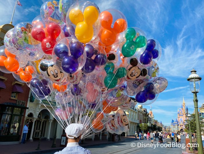 Balloons will help you easily spot your stroller from a distance - How To Find Your Stroller At Disney – Baby Journey