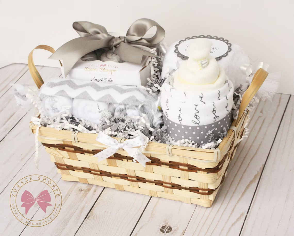 Custom gift basket with baby’s clothing - Best unique baby gifts for new parents - Baby Journey