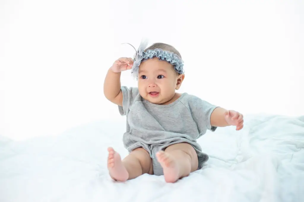 Stop Hair Pulling - Why Does My 2 Month Old Baby Pull Her Hair - Baby Journey