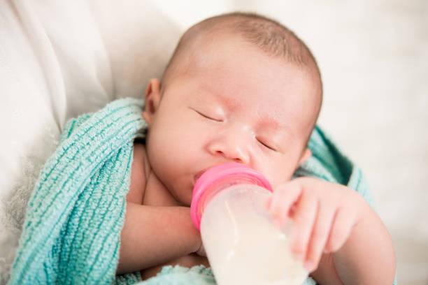 Baby Sleeping while Feeding - Why Does My Baby Fall Asleep While Bottle Feeding - Baby Journey