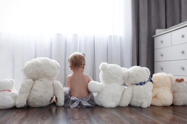 Baby with lots of teddy bears - Baby Girl Room Decorations Ideas - Baby Journey