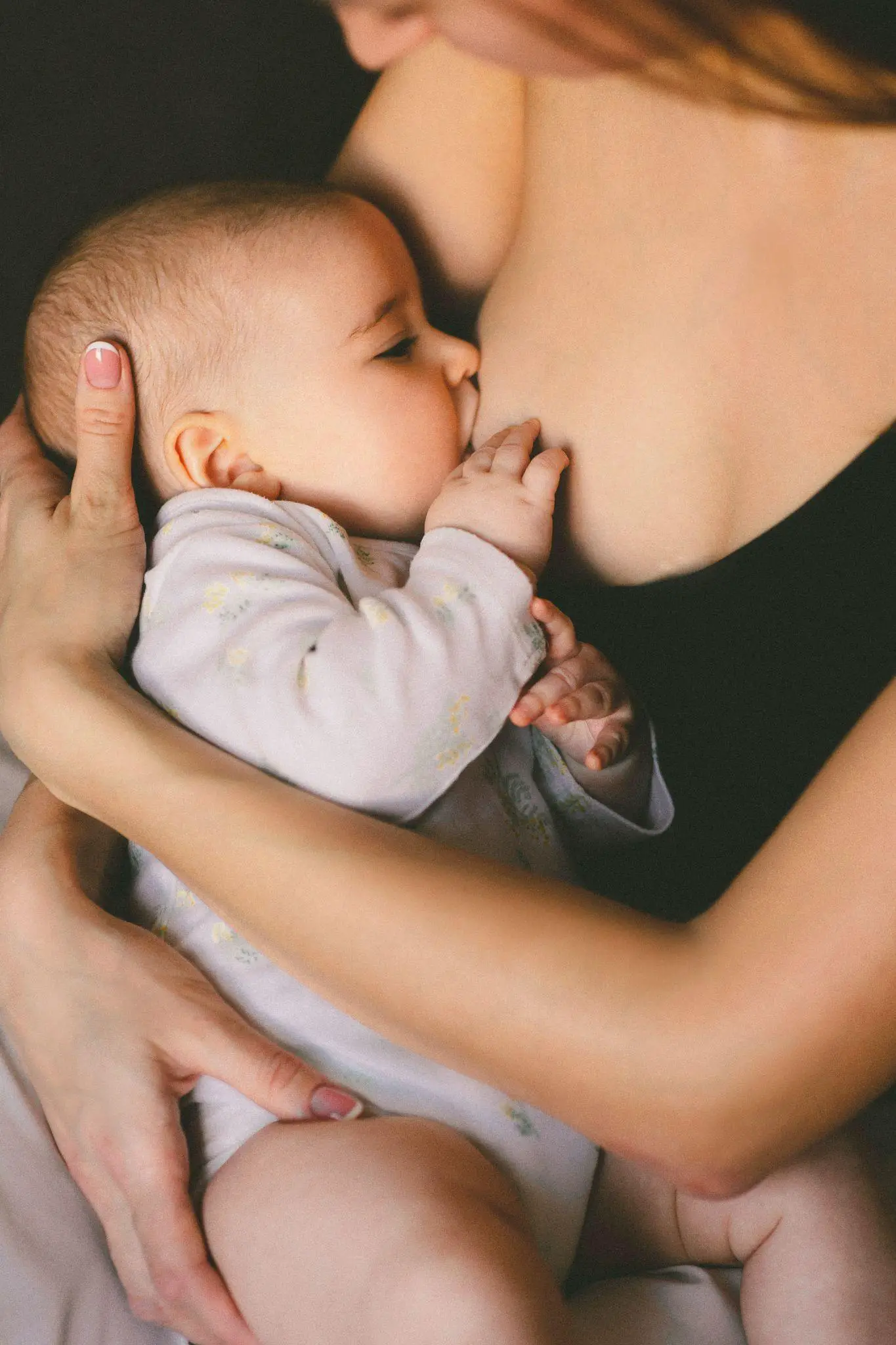Mom is breastfeeding - Why Does My Baby Keep Unlatching During Breastfeeding - Baby Journey
