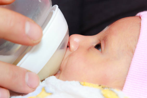 Baby Feeding - Why Does My Baby Spit Up Curdled Milk - Baby Journey  
