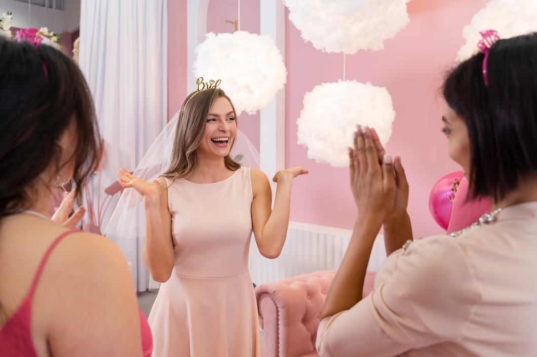 Photo of a happy bride-to-be captured during a bridal shower photoshoot with friends and family - Should You Hire the Same Photographer for Your Bridal Shower Photography and Baby Shower - Baby Journey