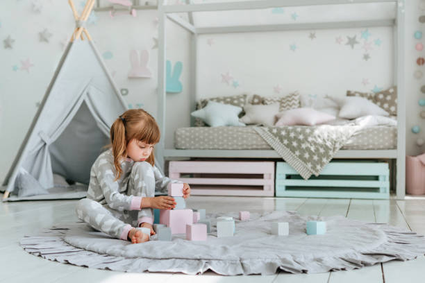 Toddler Girl Playing in Her Room - Toddler Girl Room Ideas - Baby Journey 