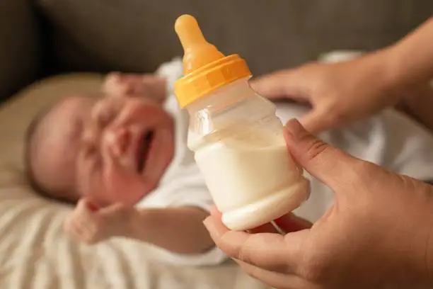  Baby cry during feeding - Why Does My Baby Cry While Eating Formula - Baby Journey