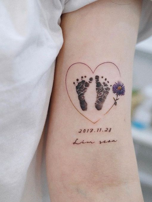 Artistic style baby footprint tattoo - Baby Journey
