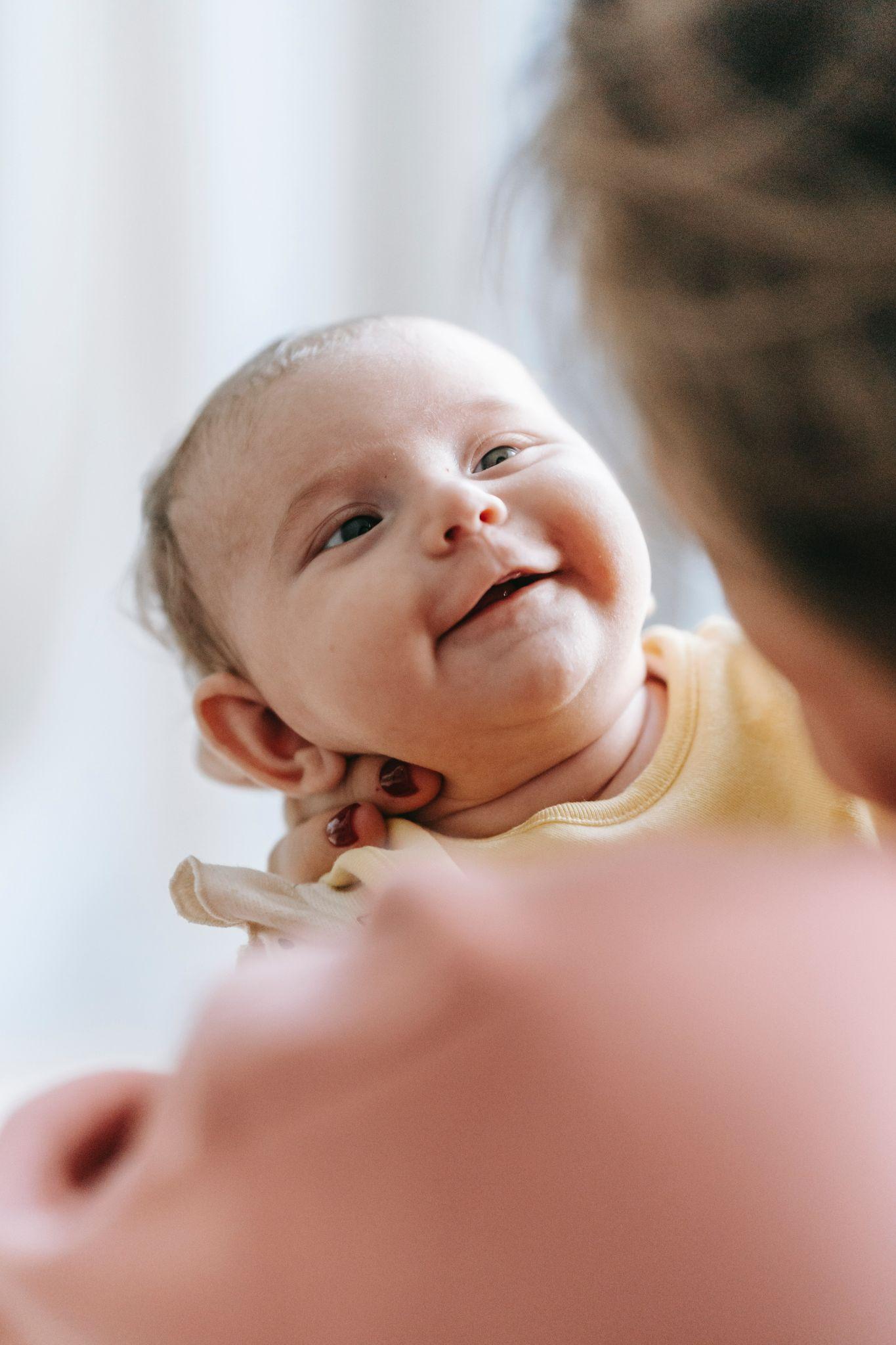 Baby smiling photo - Newborn Photoshoot - Baby Journey
