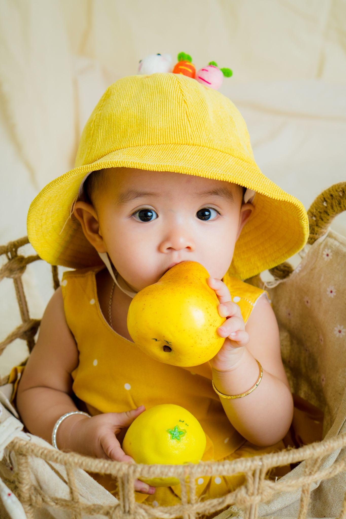 Brightly colored cute costume - Newborn Photoshoot - Baby Journey
