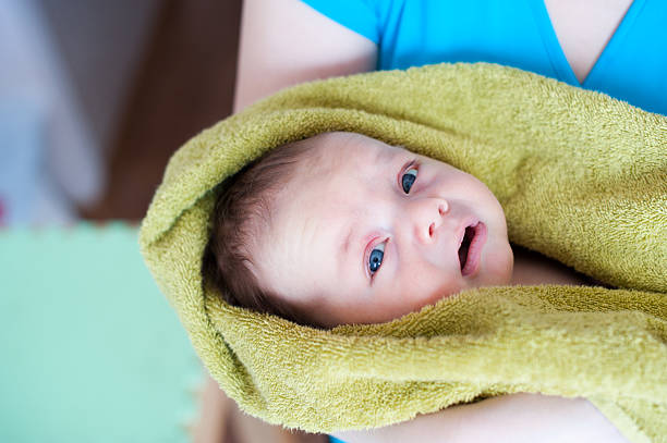 Baby in Receiving Blanket - How Many Receiving Blankets Do I Need - Baby Journey 