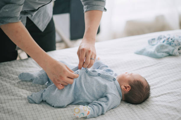  Baby in Onesies and Diaper Changes - When Do Babies Stop Wearing Onesies - Baby Journey 
