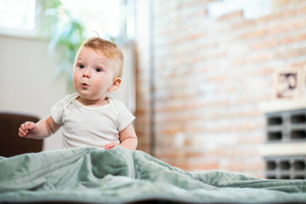 Baby in Onesies - When Do Babies Stop Wearing Onesies - Baby Journey 