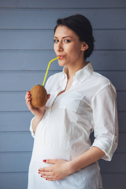 Mother is Consuming Coconut Water - How Much Coconut Water Should I Drink To Boost Milk Supply - Baby Journey