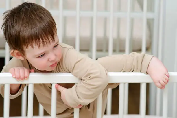Toddler boy tries to climb out of crib - Toddler Climbing Out of Crib - Baby Journey