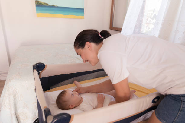 Baby in Pack n Play - How to Make Pack n Play More Comfortable for Your Baby - Baby Journey 