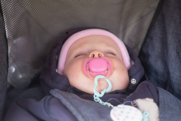 Baby Sleeping with Pacifier - How to Keep Pacifiers from Falling Out of Crib - Baby Journey