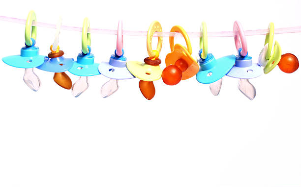 Multiple Pacifiers - How to Keep Pacifiers from Falling Out of Crib - Baby Journey