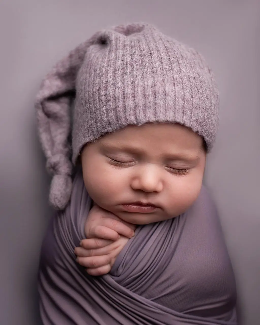A lovely sleeping baby with cozy clothes - 300+ Goth Names for Girls and Boys - Baby Journey