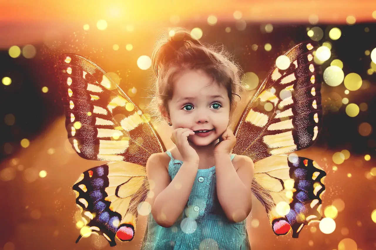 A cute and her butterfly wings glimpse at the camera - 150+ Swedish Girl Names and Meanings - Baby Journey